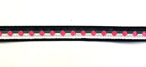 Black and white ribbon with pink dots on black webbing dog collar