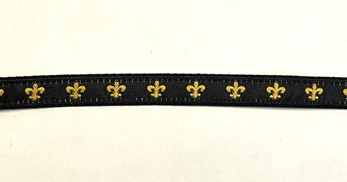 Black webbing dog collar with gold fleur de lis ribbon