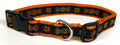 Black with Green, Red, and Yellow Geometric Star Dog Collar 1in