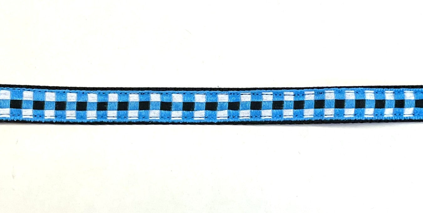 Black webbing dog collar with blue, black, and white plaid ribbon