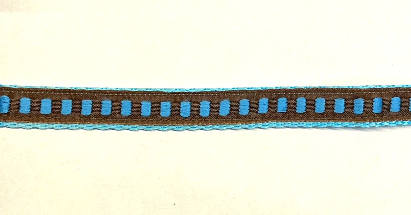 Brown ribbon with turquoise rectangles on turquoise webbing dog collar