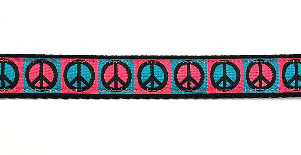Pink and teal peace signs dog collar 3/4 inch on black webbing