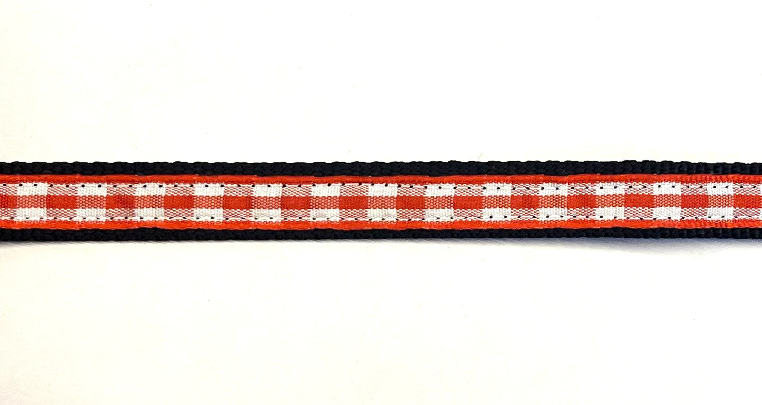 Red and white plaid dog collar on black webbing, 1/2 inch width