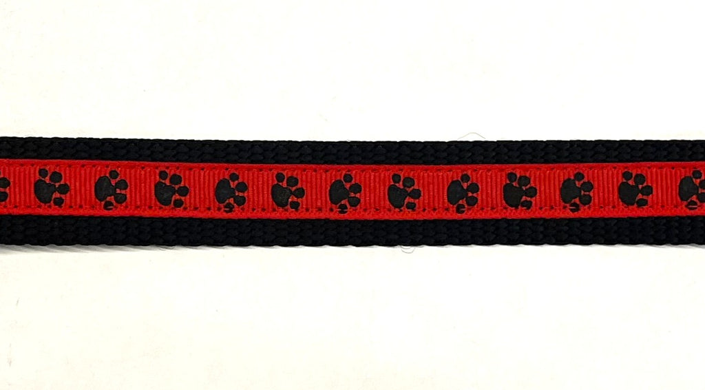 Red with Black Paw Prints Dog Collar 3/4 - red ribbon with black paw prints on black nylon webbing