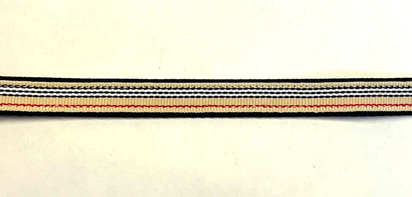 Tan, black, white, and red striped ribbon on black webbing dog collar